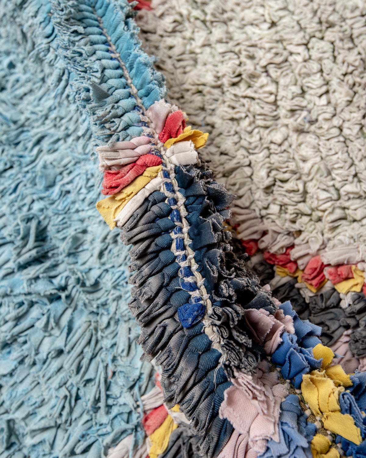Modern designer vintage handcrafted Berber rug from Morocco. Boucherouite runner rug with beautiful colors and patterns.